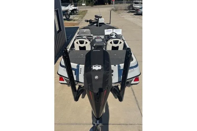 Slide: The Image of 2023 Ranger Z520R fishing boat with dual seats and advanced navigation equipment. - 4