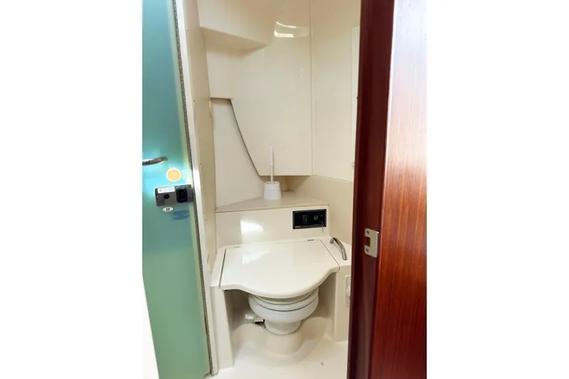 Slide: The Image of 2014 Pursuit SC 365i Sport Coupe bathroom interior with toilet and modern design. - 25
