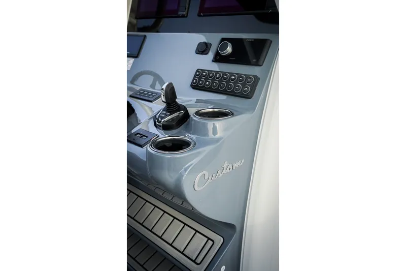 Slide: The Image of 2026 Tidewater 282 CC Adventure boat console with joystick and controls. - 20