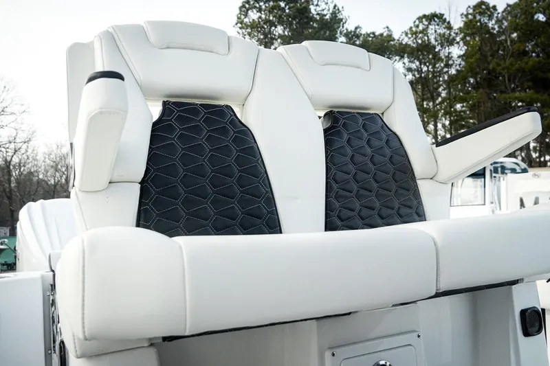 Slide: The Image of 2026 Tidewater 282 CC Adventure boat seats with stylish black and white upholstery. - 26