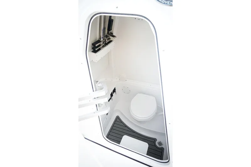 Slide: The Image of Interior view of 2026 Tidewater 282 CC Adventure boat's compact bathroom. - 34
