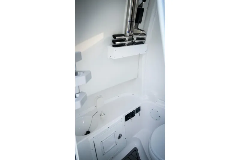 Slide: The Image of Interior of 2026 Tidewater 282 CC Adventure boat, featuring a compact, modern bathroom space. - 36