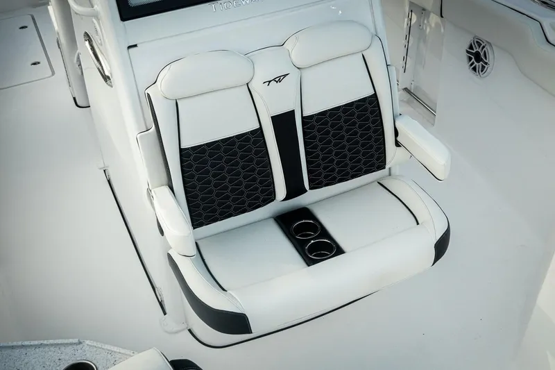 Slide: The Image of 2026 Tidewater 282 CC Adventure boat seat with cup holders and stylish design. - 42