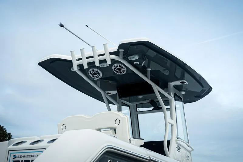 Slide: The Image of 2026 Tidewater 282 CC Adventure boat with sleek T-top and modern design. - 9