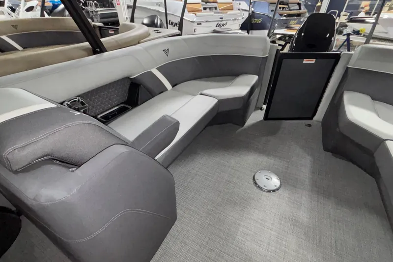 Slide: The Image of 2026 Viaggio Lago Z24U boat interior with gray seating and modern design. - 13