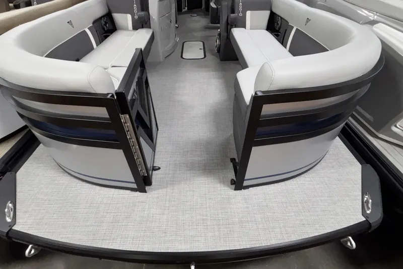 Slide: The Image of Interior of 2026 Viaggio Lago Z24U pontoon boat with sleek seating design. - 15