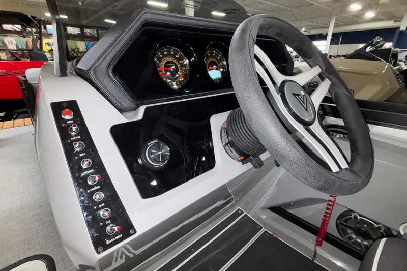 Slide: The Image of 2026 Viaggio Lago Z24U dashboard with steering wheel and control panel. - 8