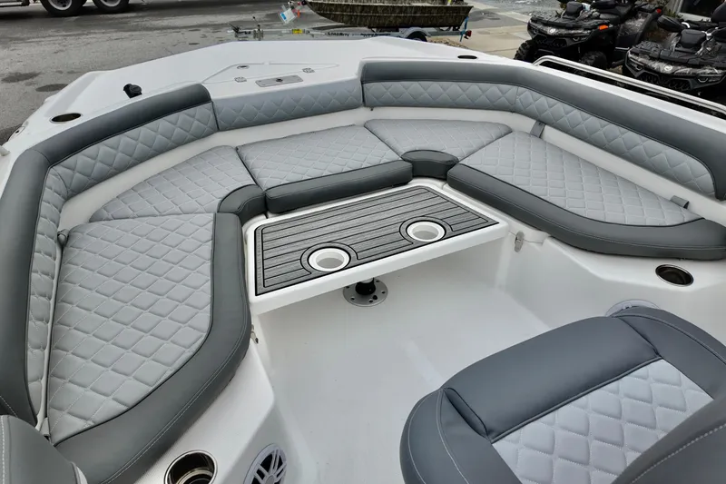Slide: The Image of Luxurious seating area on 2025 NauticStar 211 Hybrid boat with quilted upholstery. - 4