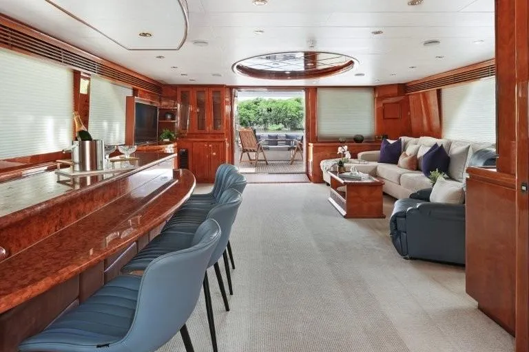 Slide: The Image of Luxurious interior of 2003 Hargrave Sky Lounge yacht with elegant seating and bar area. - 11
