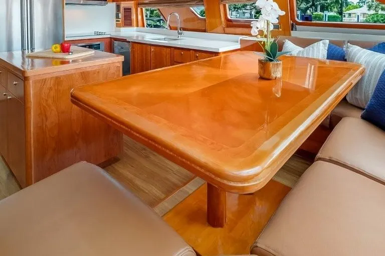 Slide: The Image of Luxurious interior of 2003 Hargrave Sky Lounge yacht with elegant wooden dining table. - 13