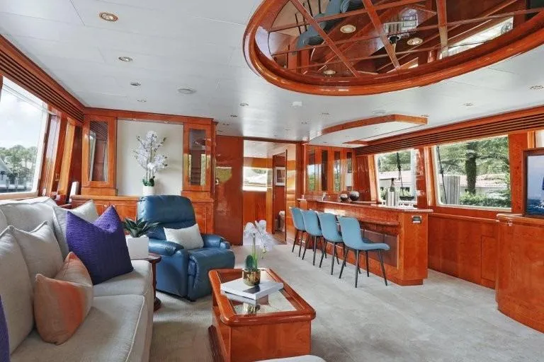 Slide: The Image of Luxurious 2003 Hargrave Sky Lounge yacht interior with elegant seating and wooden accents. - 20