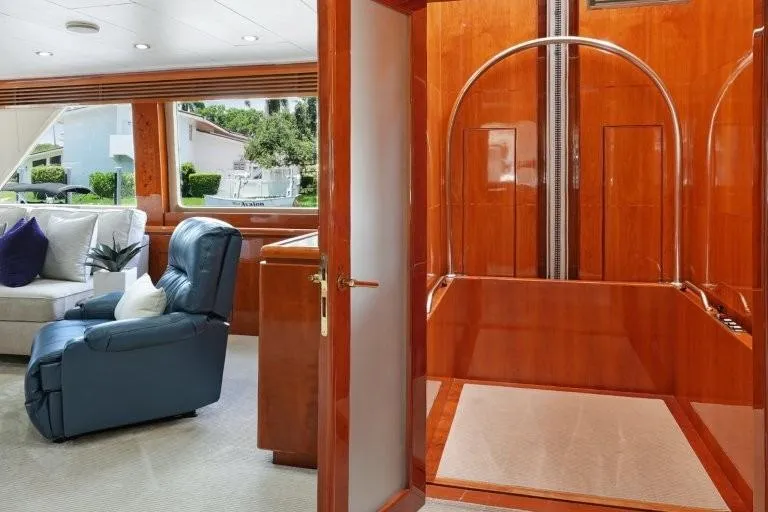 Slide: The Image of Luxurious interior of 2003 Hargrave Sky Lounge yacht with plush seating and elegant wood finishes. - 29