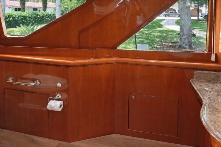 Slide: The Image of Luxurious wooden interior of 2003 Hargrave Sky Lounge yacht with scenic window view. - 34