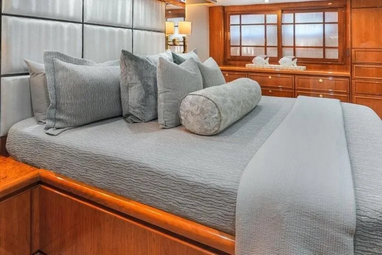 Slide: The Image of Luxurious bedroom interior on 2003 Hargrave Sky Lounge yacht, featuring elegant bedding and wood accents. - 51