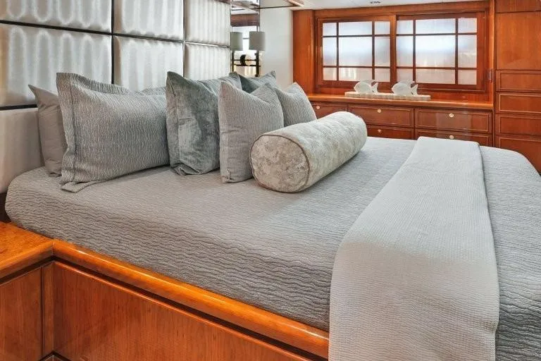 Slide: The Image of Luxurious bedroom interior on 2003 Hargrave Sky Lounge yacht, featuring elegant bedding and wood accents. - 52