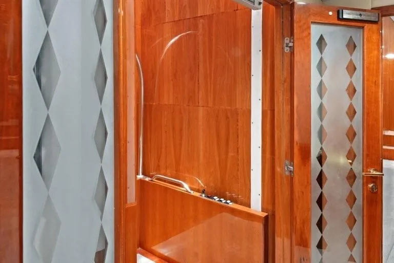 Slide: The Image of Luxurious wooden interior of 2003 Hargrave Sky Lounge yacht with elegant design elements. - 55