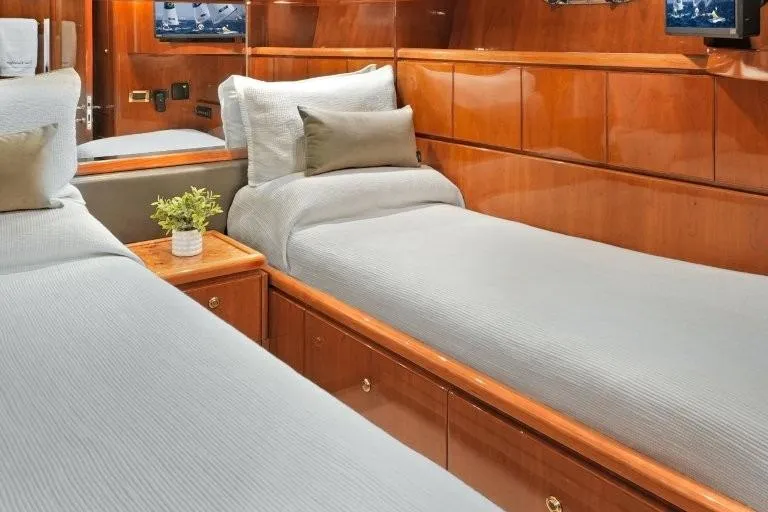 Slide: The Image of Luxurious twin cabin in 2003 Hargrave Sky Lounge yacht with elegant wood paneling. - 62