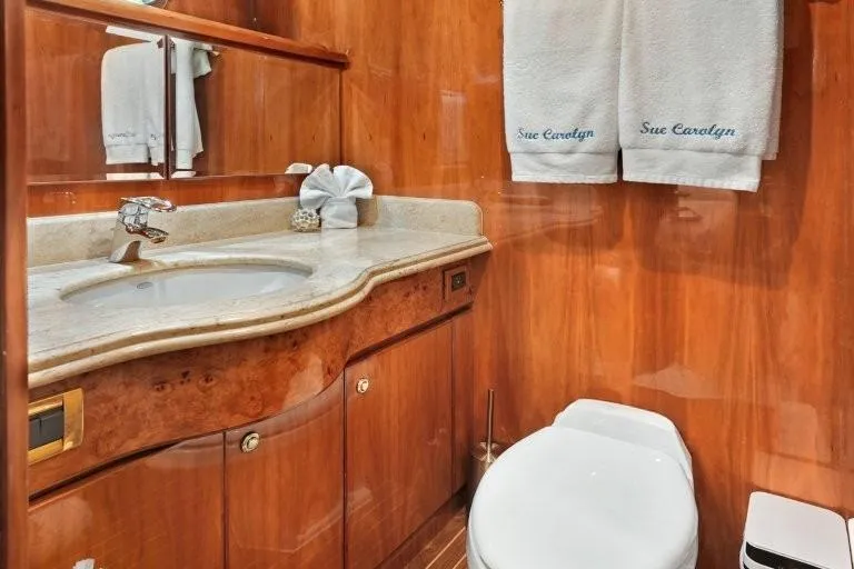 Slide: The Image of Luxurious bathroom in 2003 Hargrave Sky Lounge yacht with wood paneling and elegant fixtures. - 63