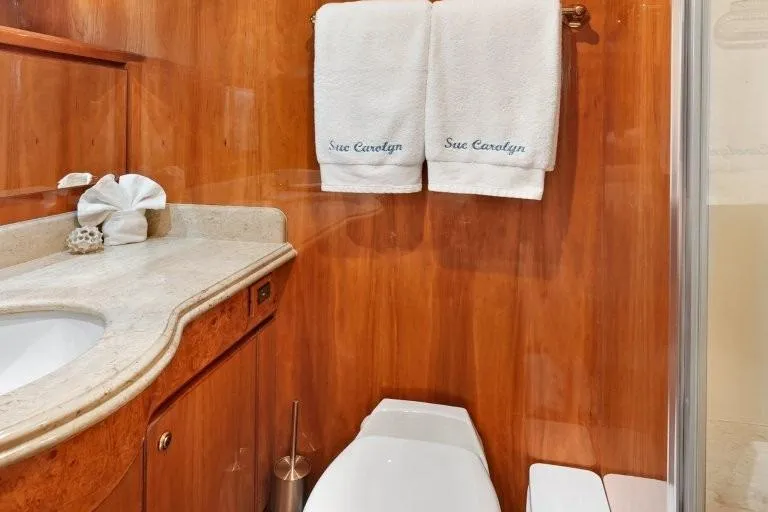 Slide: The Image of Luxurious bathroom in 2003 Hargrave Sky Lounge yacht with elegant wood paneling. - 64