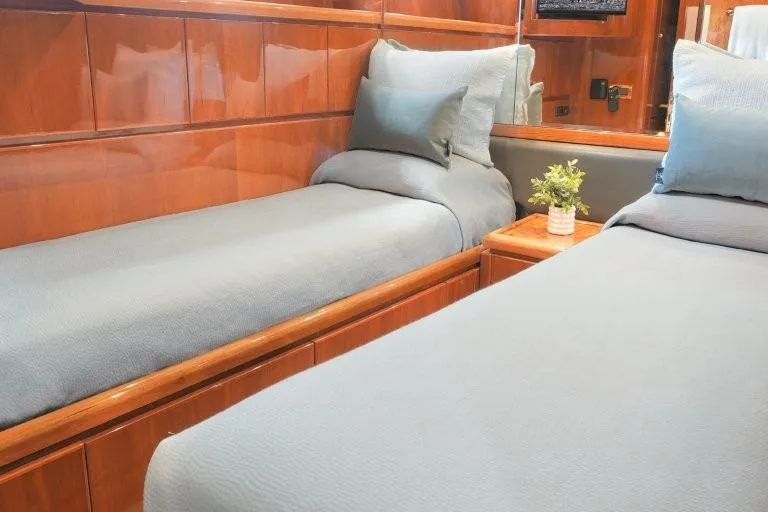 Slide: The Image of Luxurious twin cabin in 2003 Hargrave Sky Lounge yacht with elegant wood paneling. - 68