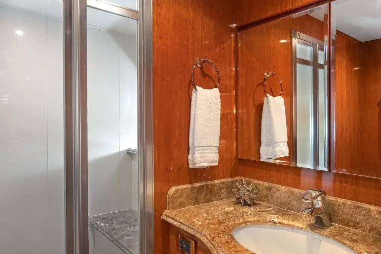 Slide: The Image of Luxurious bathroom in 2003 Hargrave Sky Lounge yacht with marble countertop and elegant fixtures. - 76