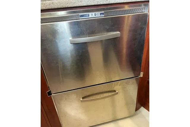 Slide: The Image of Stainless steel double-drawer appliance, Blue Jacket model 40, 2015, in a kitchen setting. - 10