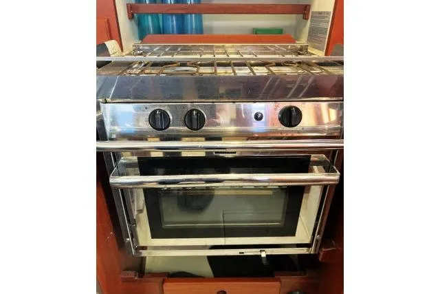 Slide: The Image of Stainless steel oven and stove in a Blue Jacket 40 sailboat, 2015 model. - 13