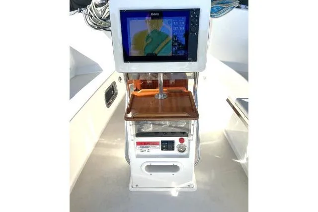 Slide: The Image of Control panel on a 2015 Blue Jacket 40 boat with navigation display. - 28