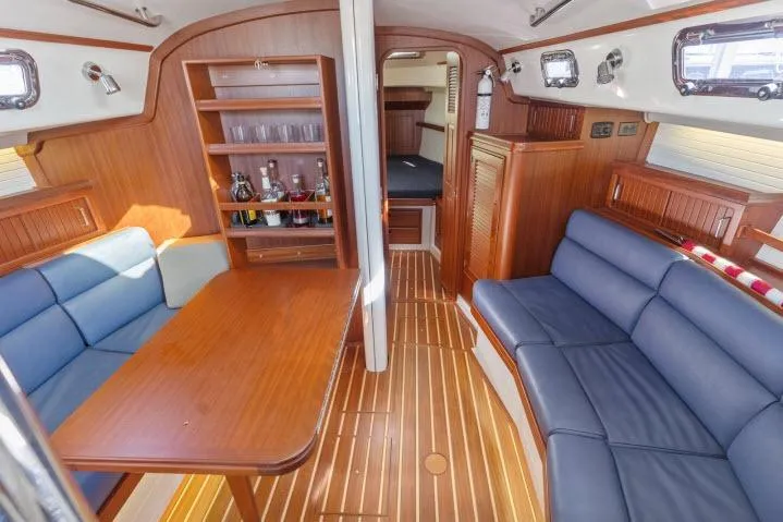 Slide: The Image of Luxurious interior of 2015 Blue Jacket 40 sailboat with wooden furnishings and seating. - 3
