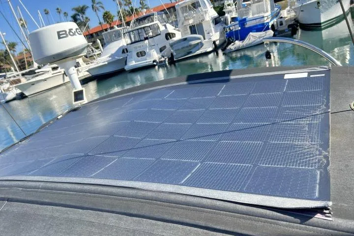 Slide: The Image of Solar panels on a 2015 Blue Jacket 40 sailboat docked in a marina. - 36