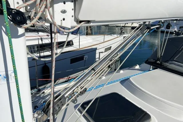 Slide: The Image of Sailboat rigging on a 2015 Blue Jacket 40, docked at a marina. - 39