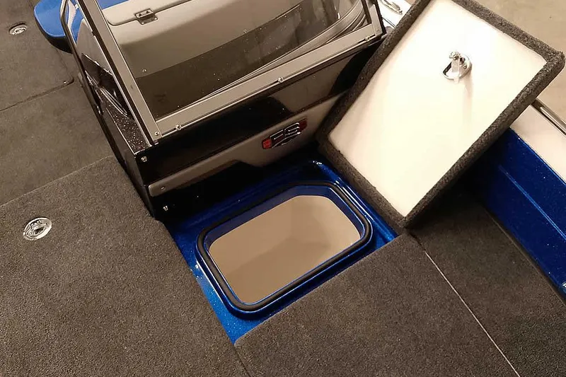 Slide: The Image of 2026 Ranger 620FS Cup-Equipped boat interior with open storage compartments. - 16