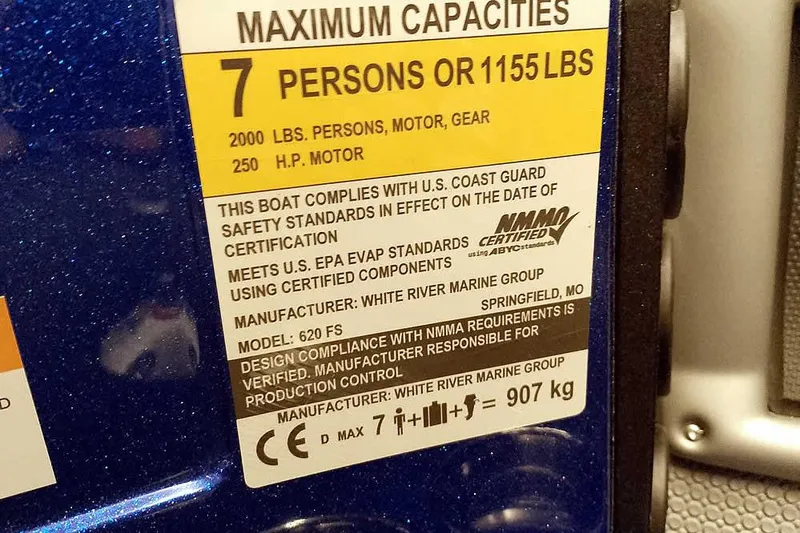 Slide: The Image of 2026 Ranger 620FS Cup-Equipped boat capacity label, 7 persons, 1155 lbs, NMMA certified. - 29