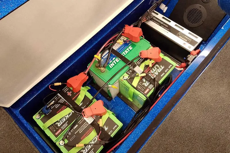 Slide: The Image of Battery compartment of 2026 Ranger 620FS Cup-Equipped boat with multiple batteries and wiring. - 41