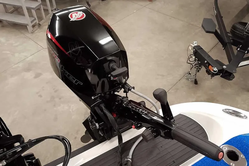 Slide: The Image of 2026 Ranger 620FS Cup-Equipped boat motor in a showroom setting. - 44