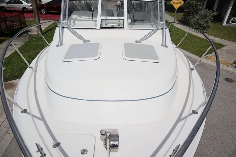 Slide: The Image of 2007 Pro-Line 32 Express boat front deck view. - 10