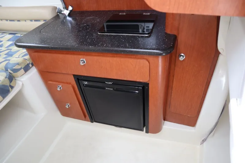 Slide: The Image of Galley in 2007 Pro-Line 32 Express with fridge and cabinets. - 18