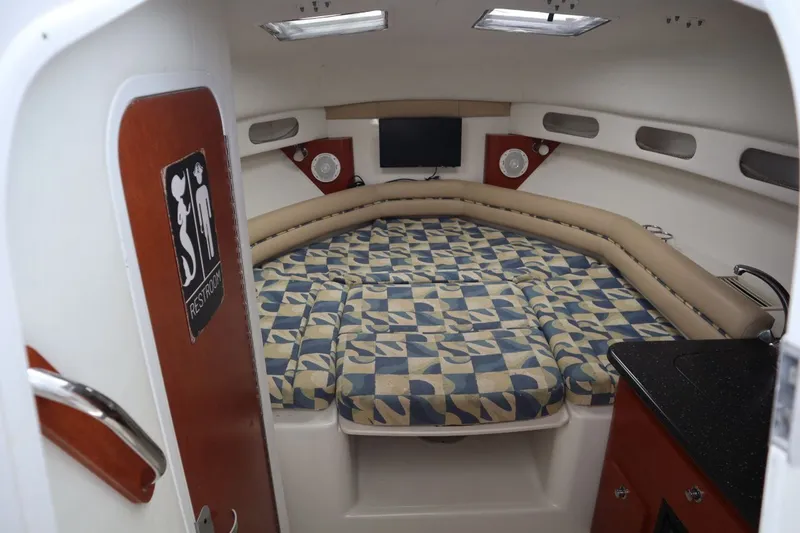 Slide: The Image of Interior of 2007 Pro-Line 32 Express with bed and TV. - 20