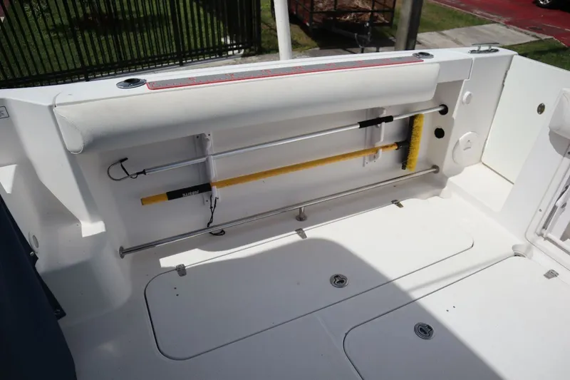 Slide: The Image of 2007 Pro-Line 32 Express boat deck with storage compartments. - 26