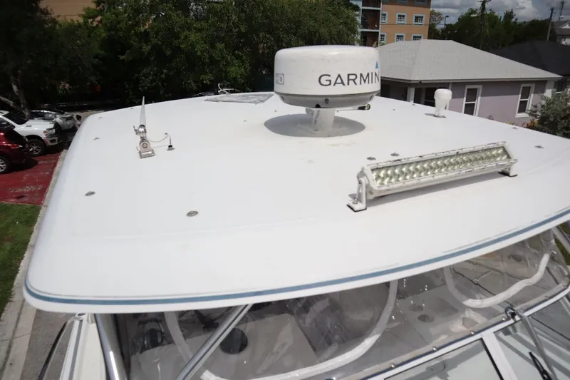 Slide: The Image of 2007 Pro-Line 32 Express boat with Garmin radar and LED light bar. - 28