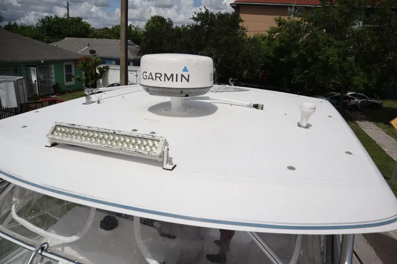 Slide: The Image of 2007 Pro-Line 32 Express boat with Garmin radar on the roof. - 29