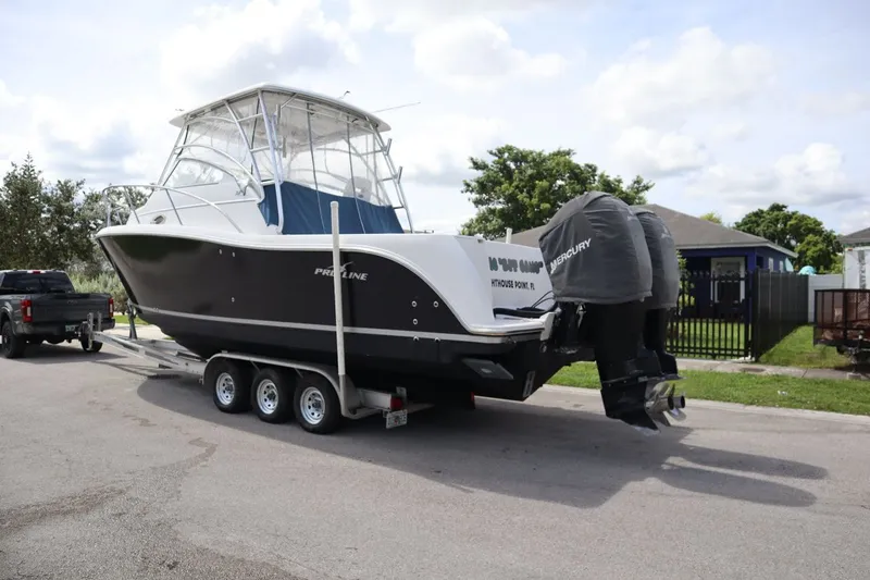 Slide: The Image of 2007 Pro-Line 32 Express boat on trailer, ready for transport. - 4