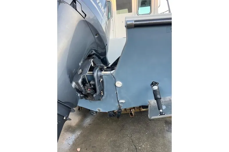 The Image of 2015 PARKER BOATS 2120 with Yamaha outboard motor, rear view. - 1