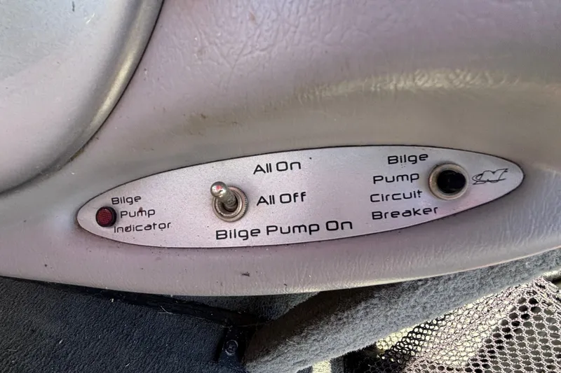 Slide: The Image of 2006 Nautique Ski Nautique 206 bilge pump control panel with indicator and circuit breaker. - 18