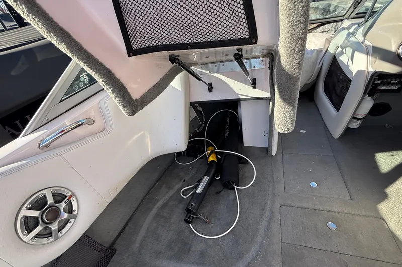 Slide: The Image of 2006 Nautique Ski Nautique 206 interior with speaker, storage, and equipment. - 8