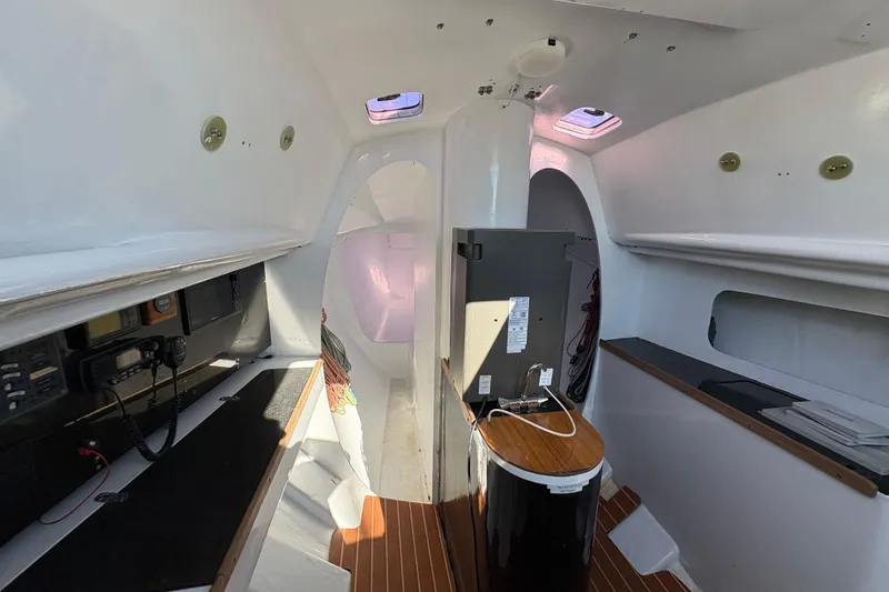 Slide: The Image of Interior of Antrim 40 sailboat with modern navigation equipment and sleek design. - 14