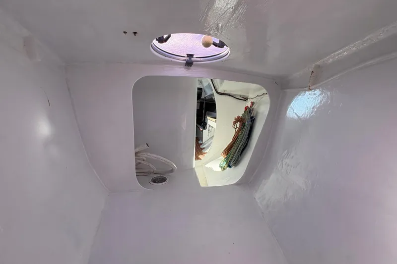 Slide: The Image of Interior view of Antrim 40 sailboat with ropes and hatch. - 13