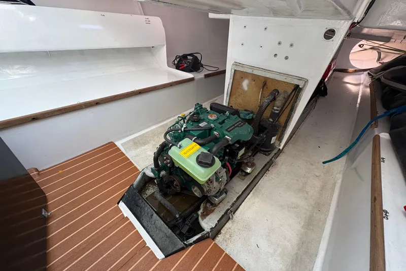 Slide: The Image of Engine compartment of Antrim 40 sailboat with visible engine and interior details. - 22