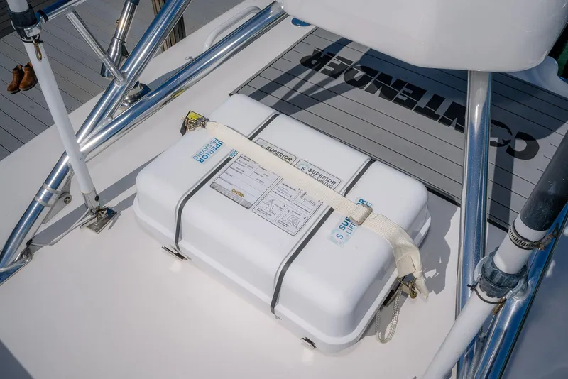 Slide: The Image of 2022 Contender 39 Fisharound deck with secured white storage box. - 48