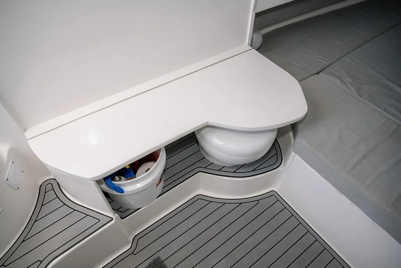 Slide: The Image of 2022 Contender 39 Fisharound interior with storage and seating area. - 6